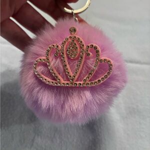 Light purple fluff ball keychain/bag charm with pink bedazzled crown NWOT